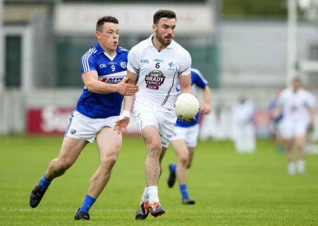 Fergal Conway in action against Robbie Kehoe