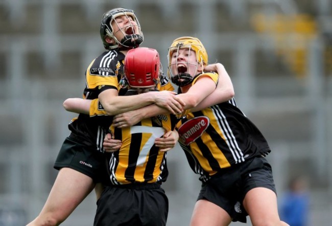 Kellyann Doyle, Laura Norris and Katie Power celebrate at the final whistle