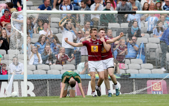 John Heslin celebrates scoring a late goal with Kieran Martin