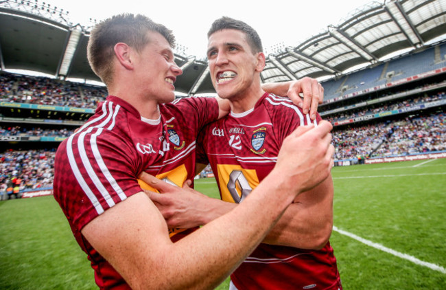 John Heslin and Denis Corroon celebrate after the game