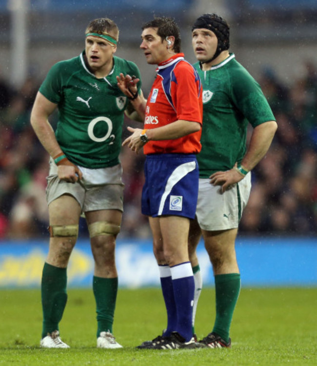 Jamie Heaslip and Mike Ross speak with referee Jerome Garces