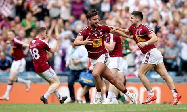 Paul Sharry celebrates with John Egan at the final whistle