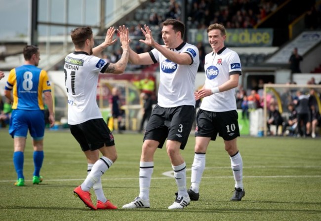 Brian Gartland celebrates scoring with Darren Meenan