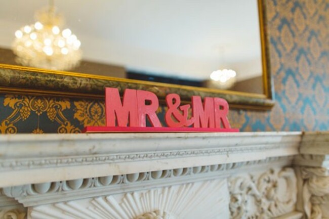 mr-and-mr-sign-Vince-and-Georges-pink-wedding-Berkshire-photographed-by-gay-wedding-photographer-Benjamin-Stuart-Photography-525x350