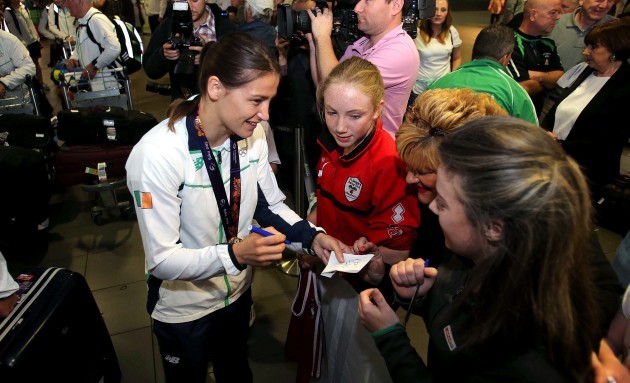 Katie Taylor signs autographs for fans