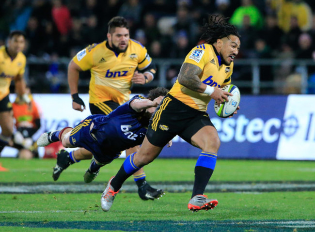 Ma'a Nonu breaks the tackle of Richard Buckman