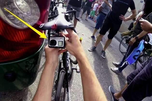 a-team-mechanic-installs-a-gopro-camera-under-a-riders-saddle