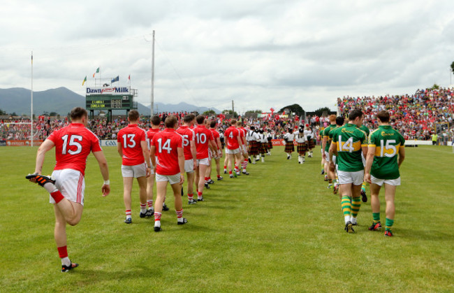 The teams parade before the game