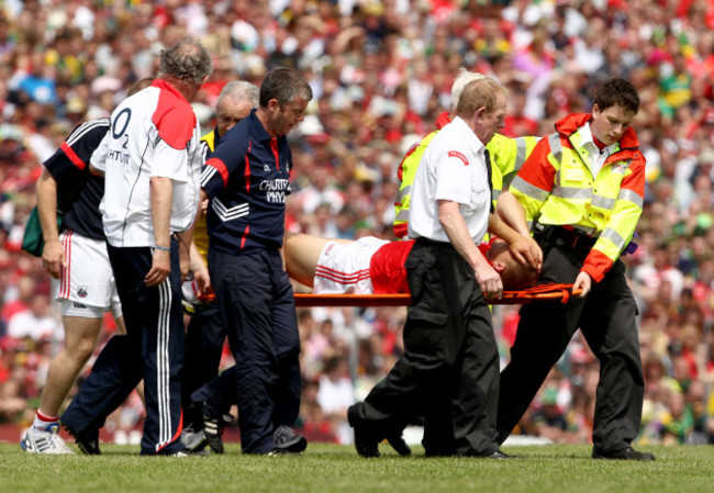 Ciaran Sheehan leaves the field with an injury