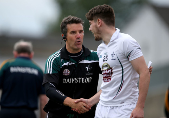 Jason Ryan celebrates with Mark Sherry after the game