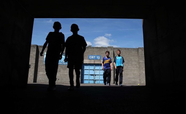 Young Tipp supporters make their way through the tunnel to the match