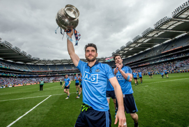 Bernard Brogan celebrates with the trophy