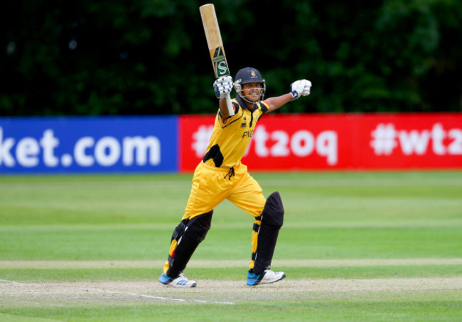 Norman Vanua celebrates hitting a six and winning the match