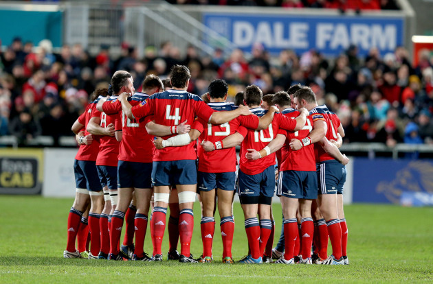 Munster team huddle before the game