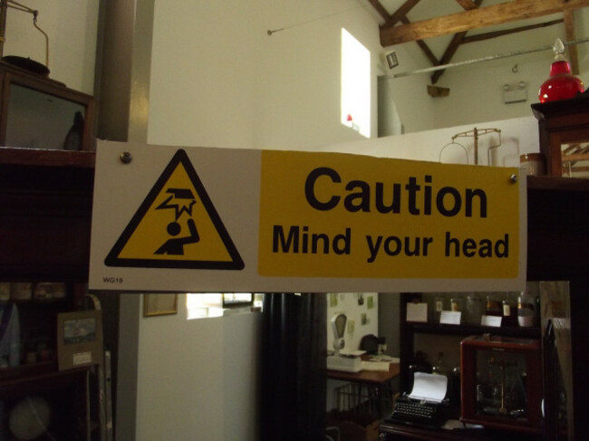 Apothecary Hall - National Botanic Garden of Wales - sign - Caution Mind your head