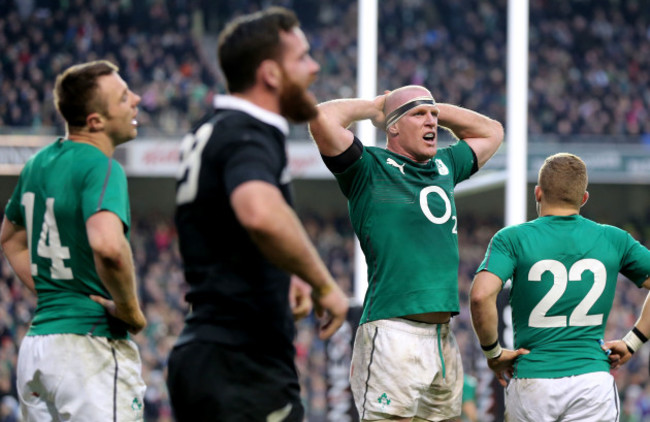 Tommy Bowe and Paul O'Connell dejected after Ryan Crotty scored a late try