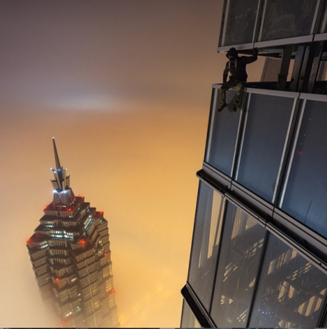 one-of-the-tallest-buildings-they-climbed-is-the-2132-foot-high-shanghai-tower-in-china-their-video-climbing-it-went-viral-immediately-which-even-landed-them-a-corporate-sponsor