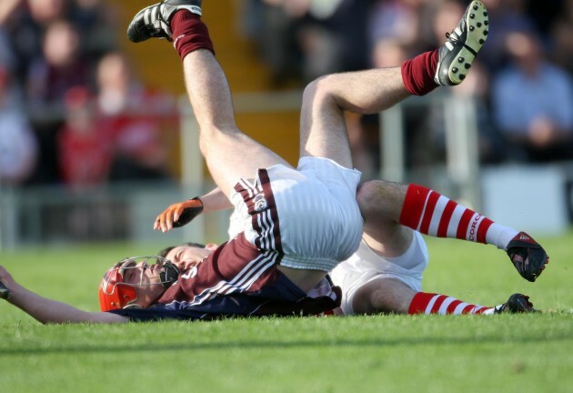 Donal Og Cusack brings down Alan Kerins of Galway