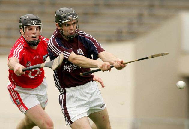 Kerril Wade scores a goal under pressure from Shane O'Neill 25/8/2007