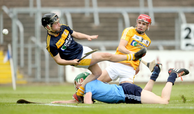 Fergal Whitely scores his sides second goal despite goalkeeper Benny Connor and Donal Carey