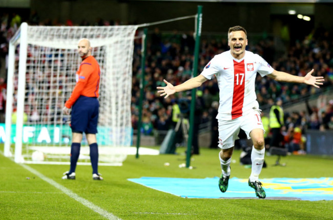 Slawomir Peszko celebrates scoring