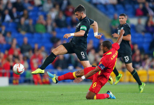 Shane Long gets past Ashley Williams