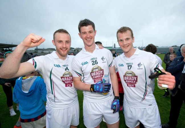 Alan Smith, Padraig Fogarty and Peter Kelly celebrate after the game