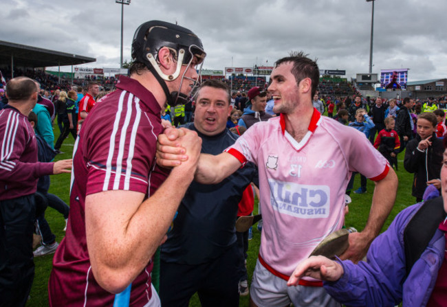 Joseph Cooney and Johnny Coen celebrate after the game