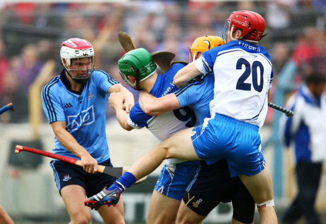 Dublin and Waterford players clash during the final moments of the match