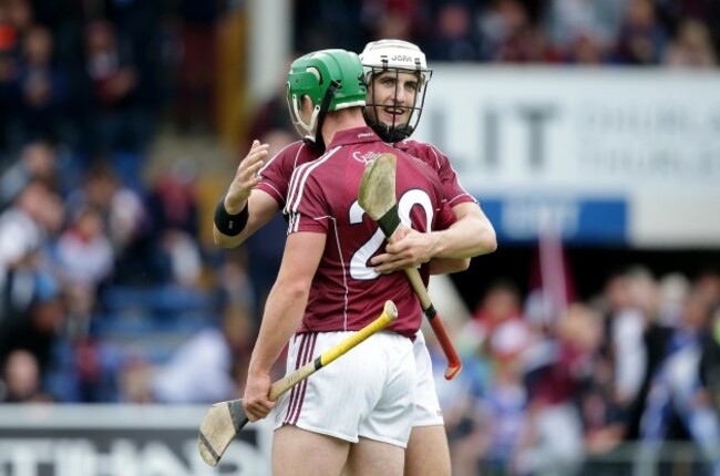 Daithi Burke and Greg Lally celebrate after the game