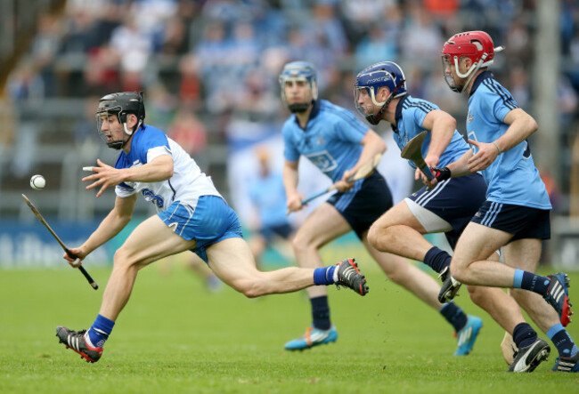 Jamie Barron gets away from Conal Keaney and Niall McMorrow