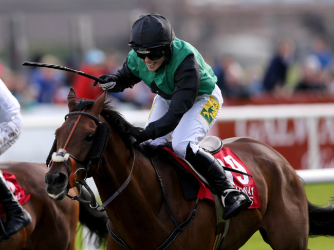 Modem ridden by Kate Harrington celebrates as she comes home to win