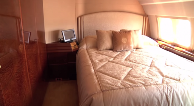 -a-silk-lined-master-bedroom-equipped-with-
