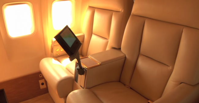 the-seats-have-personal-entertainment-systems-they-convert-into-beds