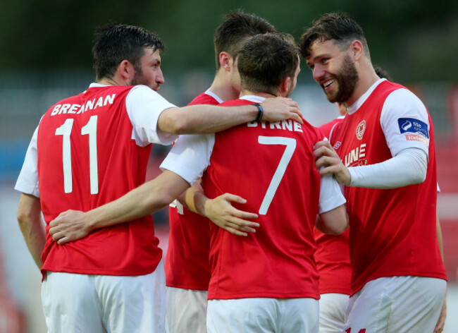 Conan Byrne celebrates scoring with Killian Brennan and James Chambers