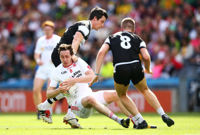 Brendan Egan tackles Colm Cavanagh