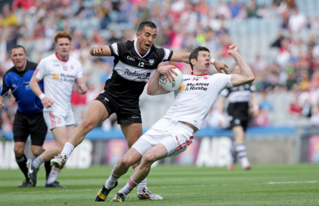 Neil Ewing with Sean Cavanagh