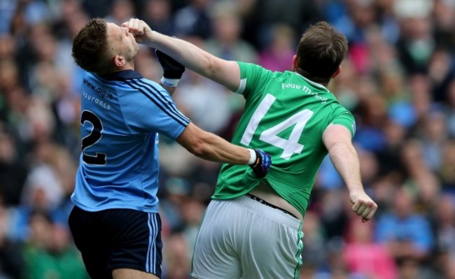 Jonny Cooper with Sean Quigley