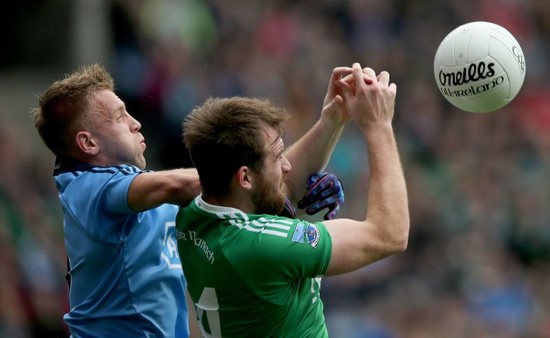 Jonny Cooper with Sean Quigley