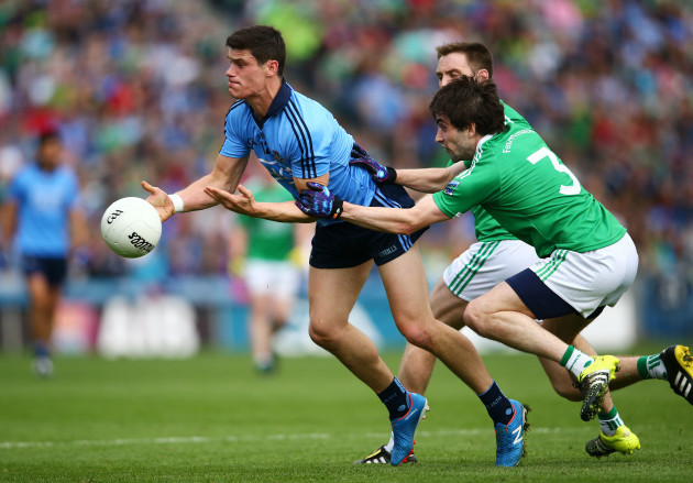 Diarmuid Connolly is tackled by Marty OÕBrien
