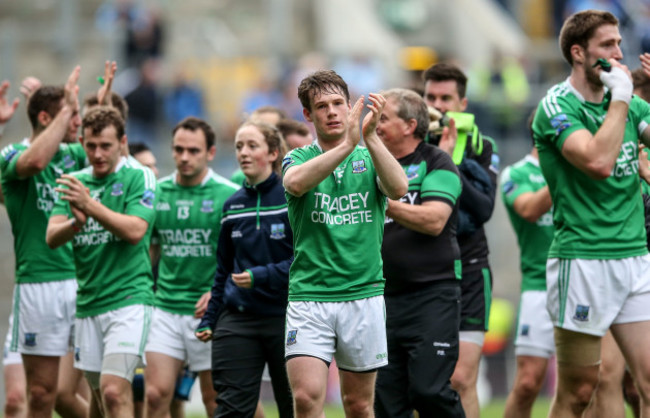 Tomas Corrigan waves at the fans