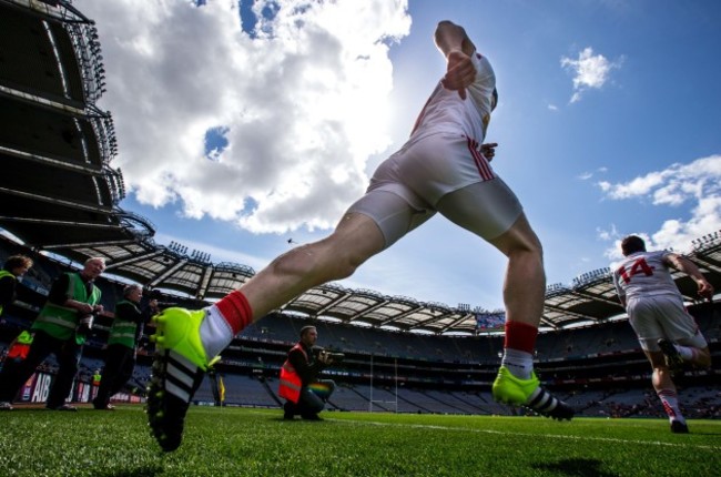 Tyrone players make there way out onto there pitch