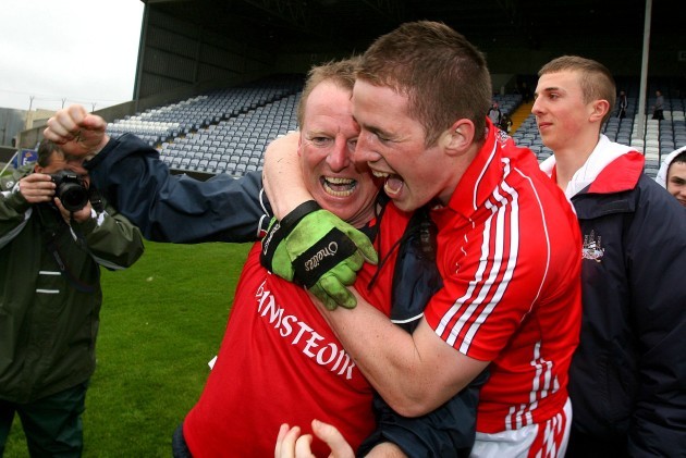 John Cleary celebrates with captain Colm O'Neill