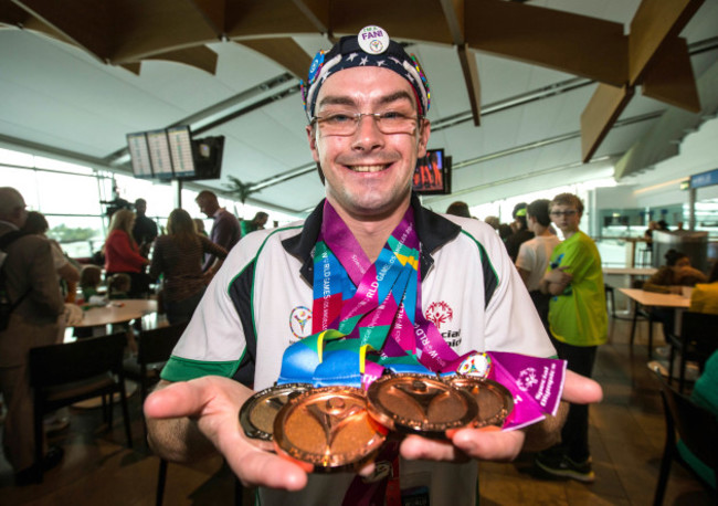 Patrick Quinlivan with his haul of medals