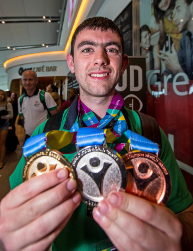 James Meenan with his gold, sliver and bronze medals