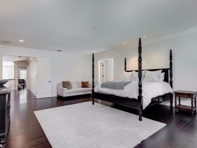 the-oversize-master-suite-features-hardwood-floors-and-a-spacious-airy-layout