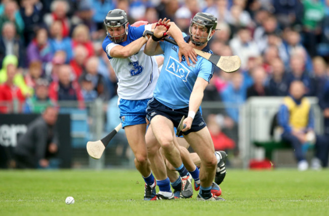 Tadhg de Burca and Darragh Fives tackle Mark Schutte