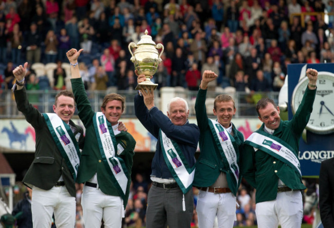 Robert Splaine with The Furusiyya FEI Nations Cup as Team Ireland celebrate