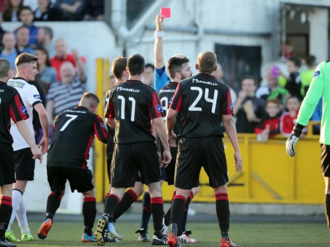 Referee Tomas Connolly shows a red card to Longford's Mark Salmon