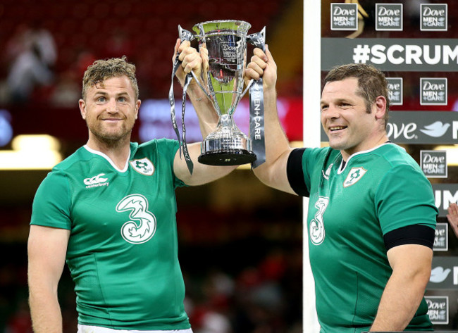 Jamie Heaslip and Mike Ross lift the trophy